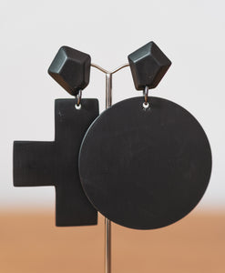 Naught and cross earring