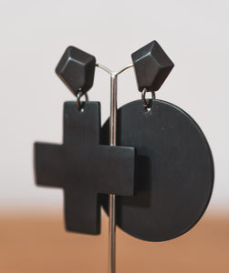 Naught and cross earring